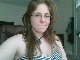 Chubby teen at hand glasses masturbates on webcam