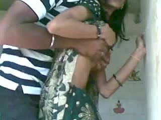Homemade video with Indian team of two having clothed lovemaking